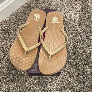 Tan color Tory Burch flip-flops